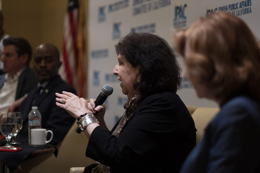 Dr. Anita Friedman speaks on a panel with Senator Henry Stern, State Superintendent Tony Thurmond, and Roxanne Makasdjian of the Genocide Education Project.